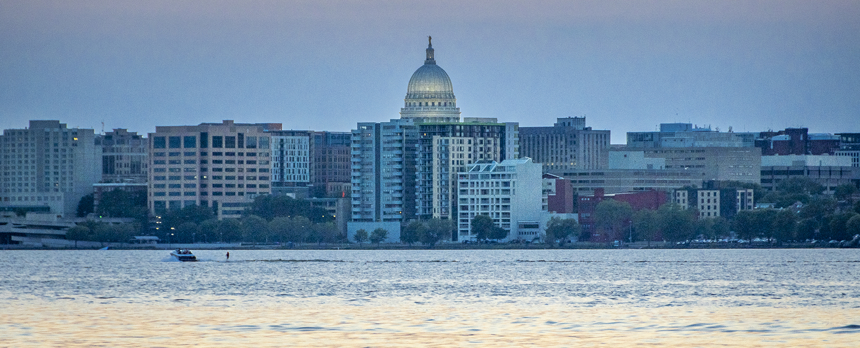 Water skiing at dusk on Lake Monona in Madison, Wisconsin