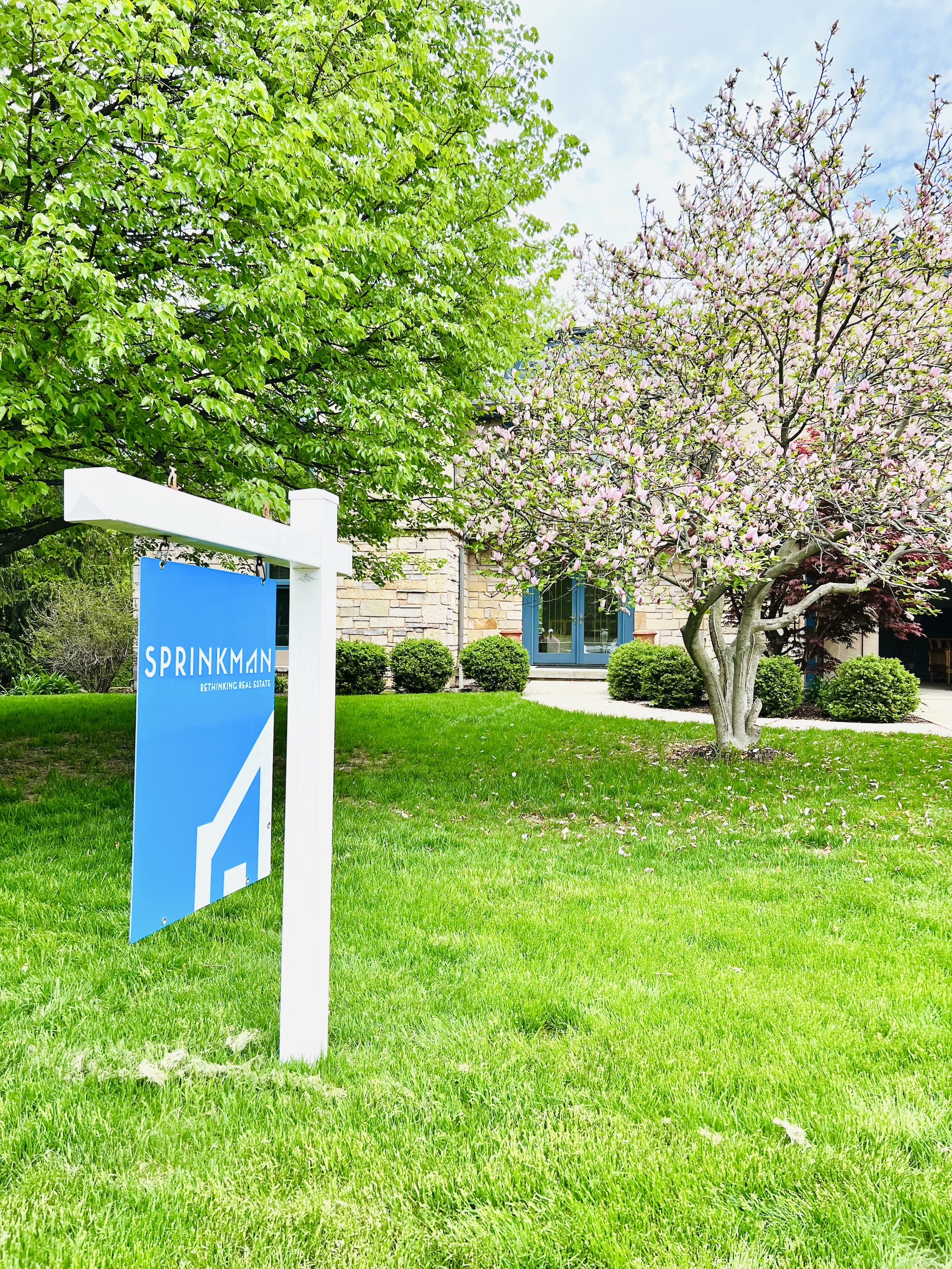 Sprinkman Real Estate Blue Yard Sign